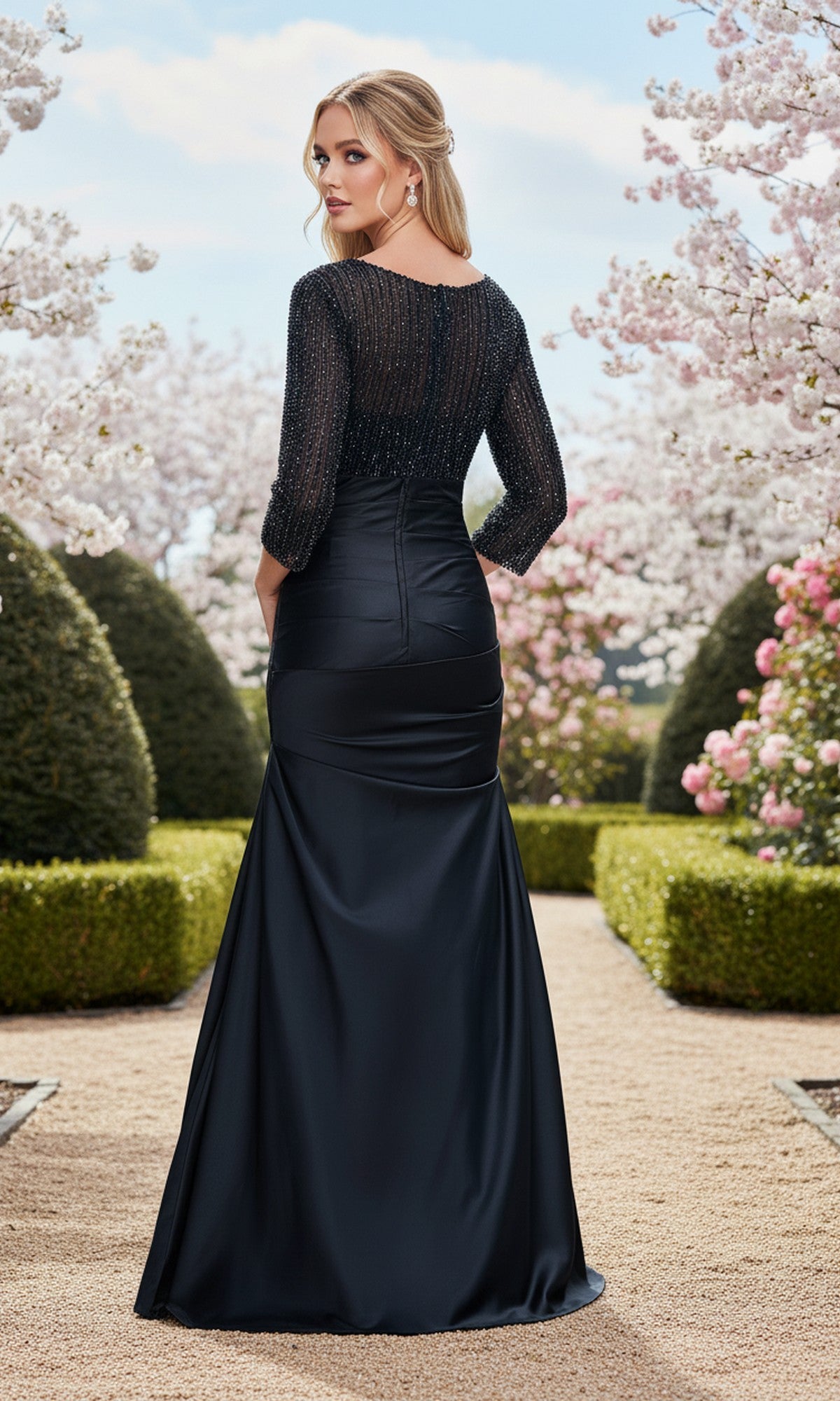 A woman stands on a gravel path outdoors, surrounded by blooming trees and manicured hedges, wearing the Long Prom Dress: La Femme 33659—a formal evening gown with a beaded bodice and satin floor-length skirt.
